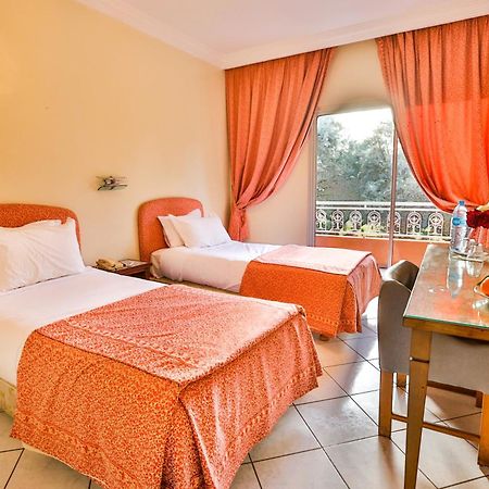 Complexe El Bassatine Hotel Бени Мелал Екстериор снимка