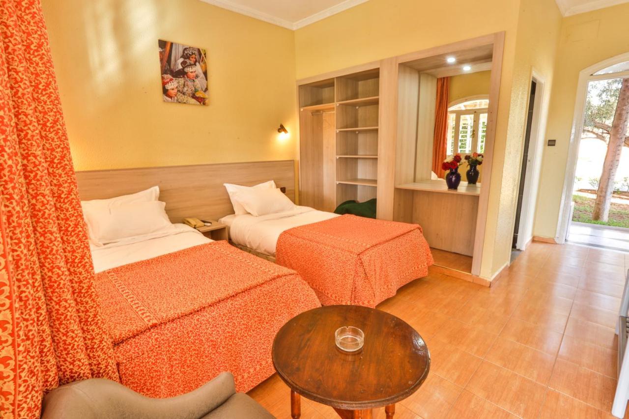 Complexe El Bassatine Hotel Бени Мелал Екстериор снимка