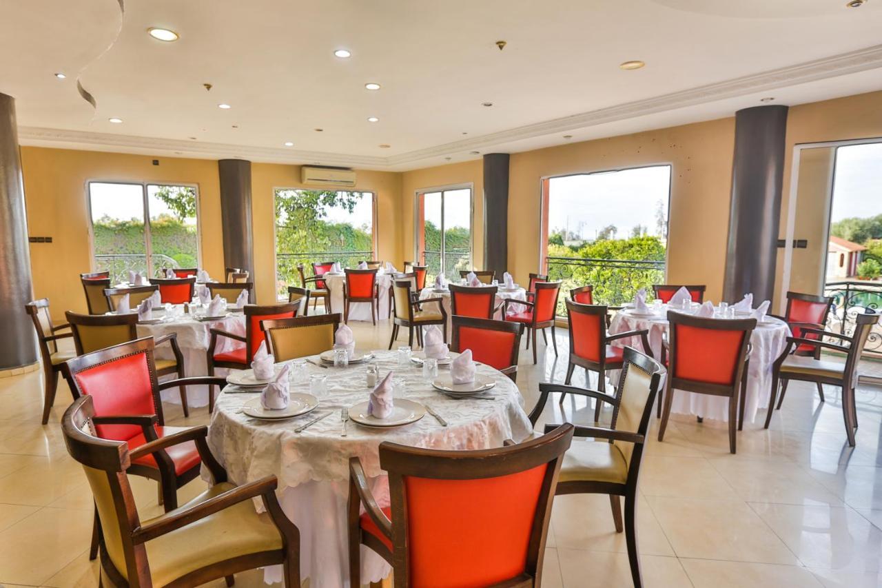 Complexe El Bassatine Hotel Бени Мелал Екстериор снимка