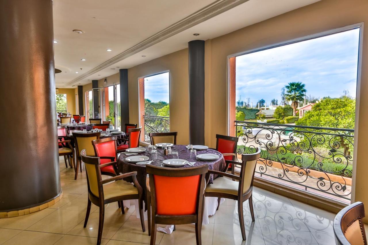 Complexe El Bassatine Hotel Бени Мелал Екстериор снимка