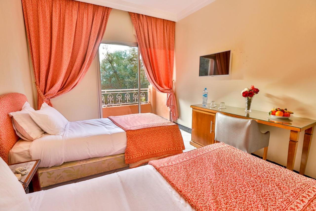Complexe El Bassatine Hotel Бени Мелал Екстериор снимка