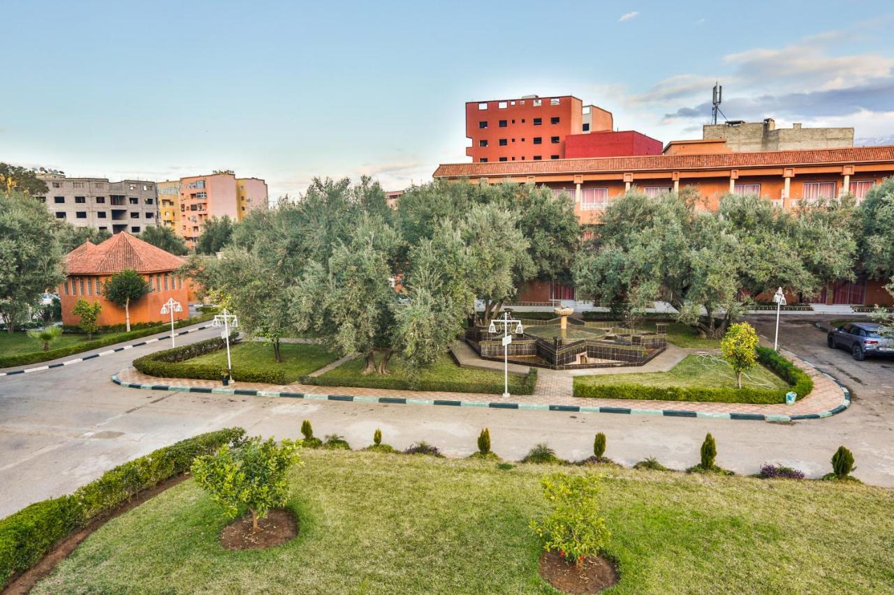 Complexe El Bassatine Hotel Бени Мелал Екстериор снимка