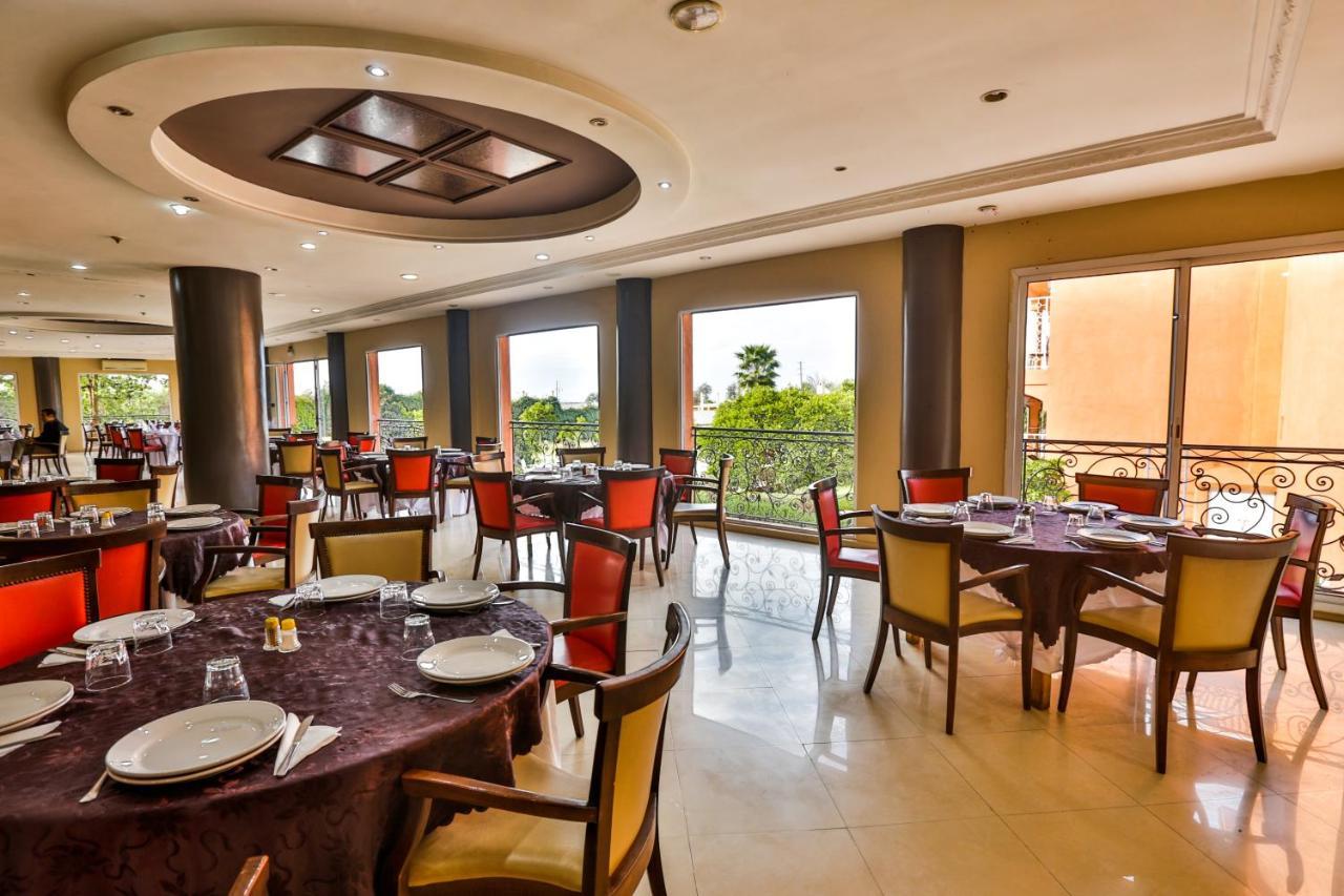 Complexe El Bassatine Hotel Бени Мелал Екстериор снимка