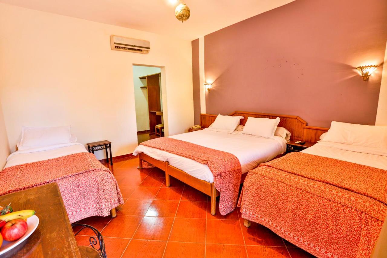 Complexe El Bassatine Hotel Бени Мелал Екстериор снимка
