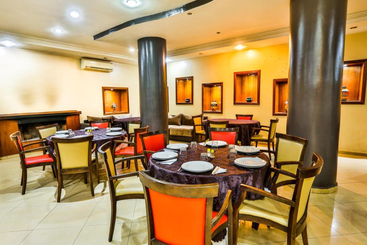Complexe El Bassatine Hotel Бени Мелал Екстериор снимка