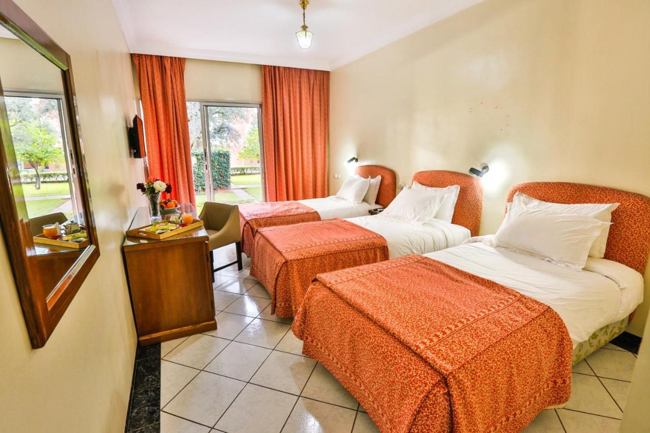 Complexe El Bassatine Hotel Бени Мелал Екстериор снимка